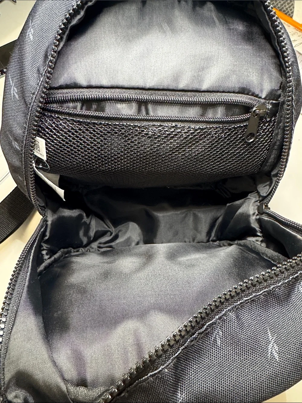 Reebok Black Mini Backpack with Subtle Logo Print. Excellent Condition